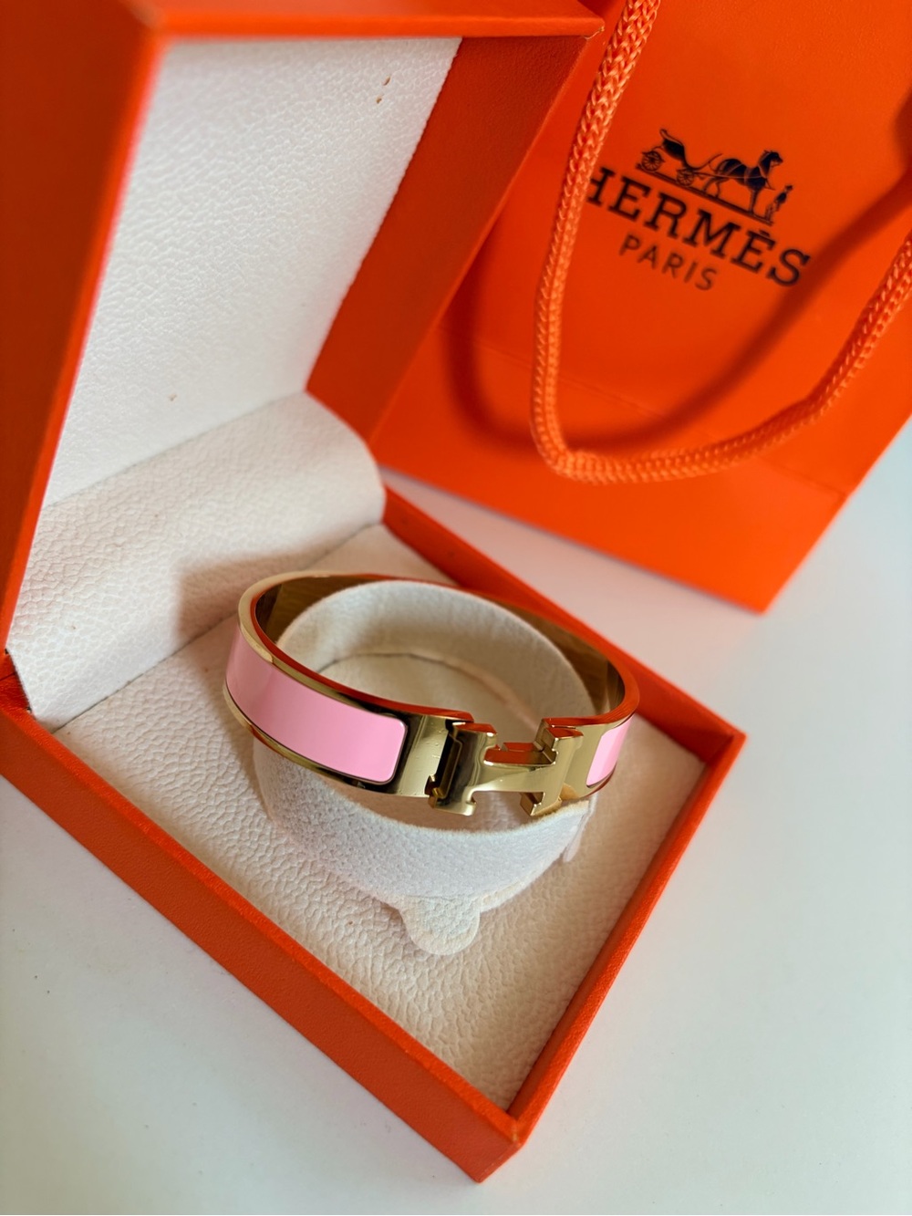 Hermès Clic H Bracelet in Pink & Gold
